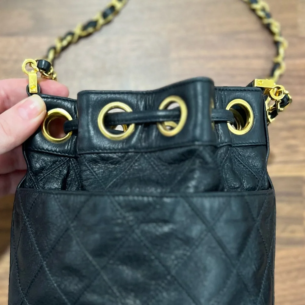 CHANEL Black Quilted Leather Drawstring Bucket Bag with Gold Hardware